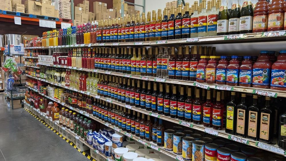 Grocery aisle with canned, jarred, and bottled goods