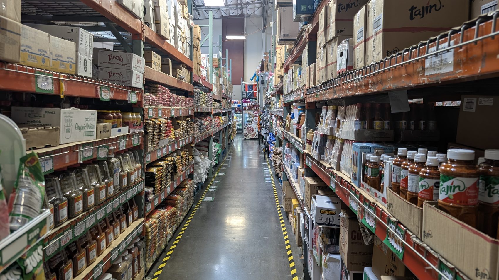 Aisle of wholesale goods inside Central Cash & Carry in San Jose